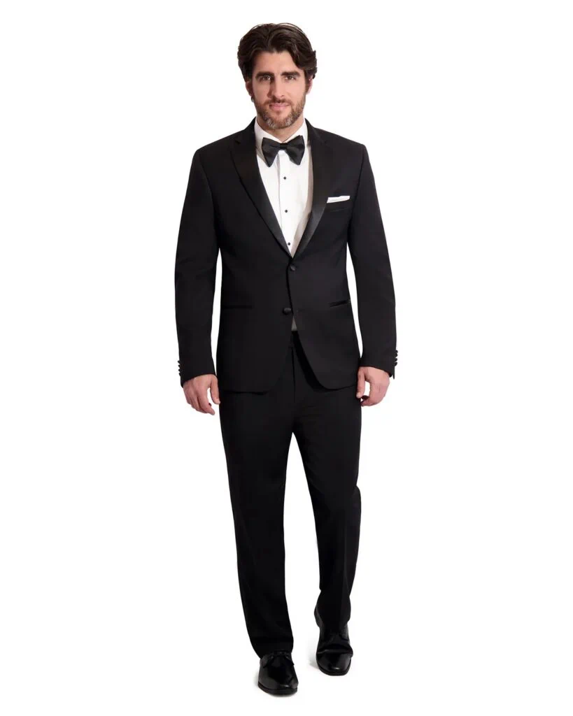 A man modeling the black heritage tuxedo rental