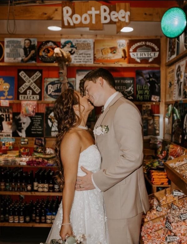 bride and groom in tan suit rental