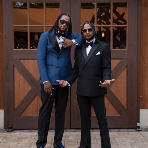 groom and groomsman dressed in tuxedo rentals
