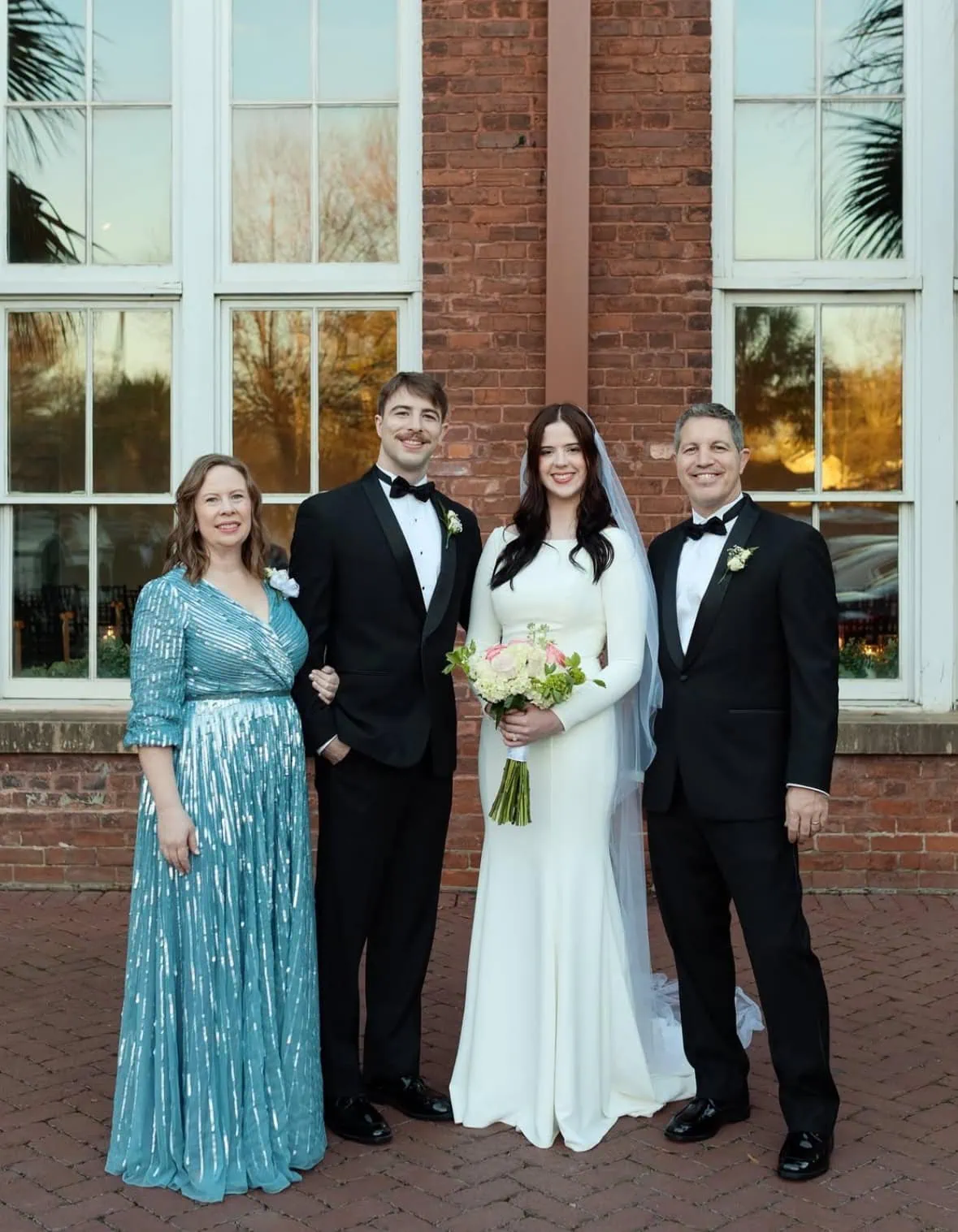 Screenshot family photo at wedding