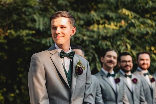 groomsmen party in perry ellis madison tuxedos