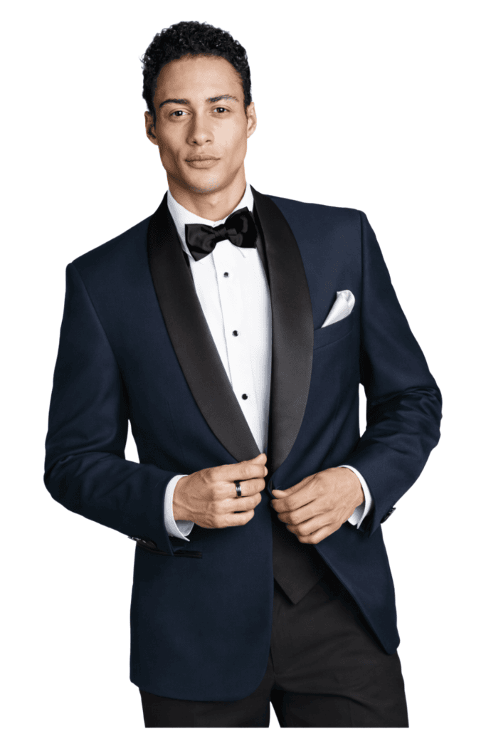 A model poses while wearing the navy london rental tuxedo package.