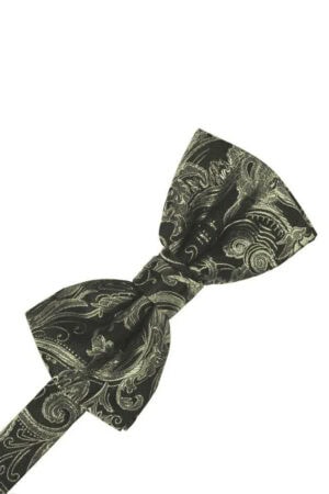 Black bow tie with gold paisley pattern on a white background about to be tied