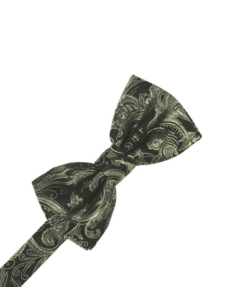 Black bow tie with gold paisley pattern on a white background about to be tied