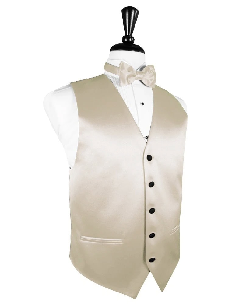 Beige satin men's vest with a matching bow tie on a white dress shirt displayed on a mannequin bust.