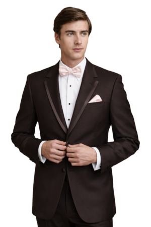 A young man wears the chocolate brown edge tuxedo package.