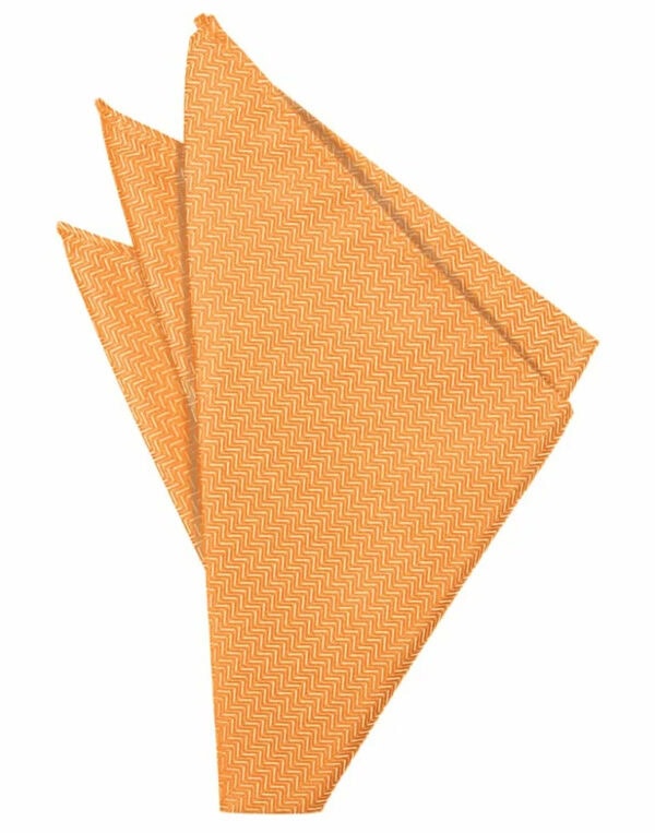 Three orange napkins with a small chevron pattern, folded in an overlapping, fan-like arrangement.