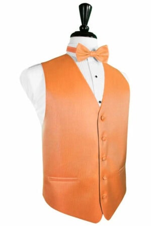 Orange formal waistcoat with matching bow tie over a white dress shirt on a mannequin,Display wear for a smart occasion
