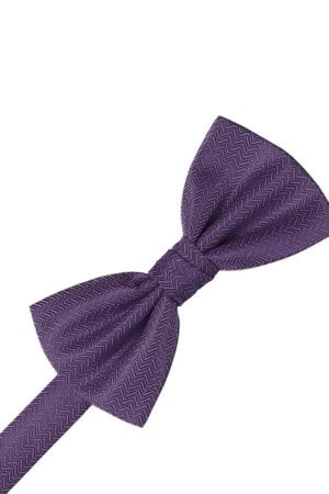 Purple bow tie with a herringbone pattern tied in a knot on a white background.
