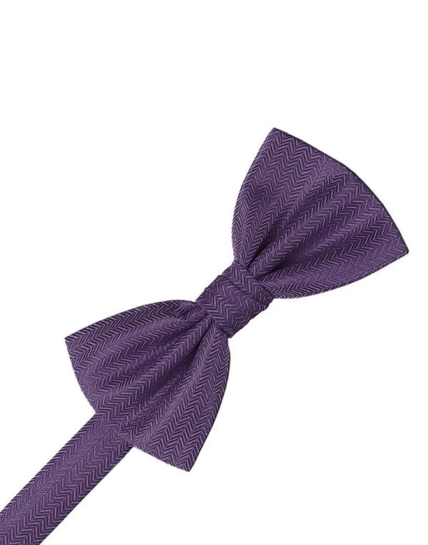 Purple bow tie with a herringbone pattern tied in a knot on a white background.