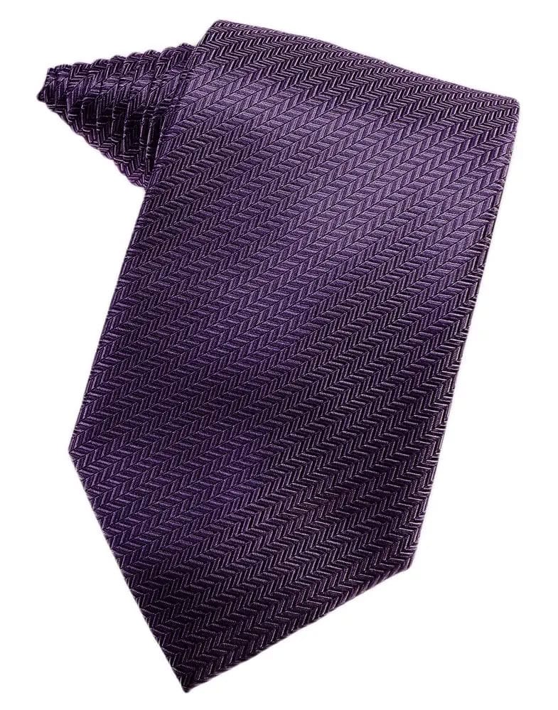 Purple necktie with a subtle herringbone weave laid flat.