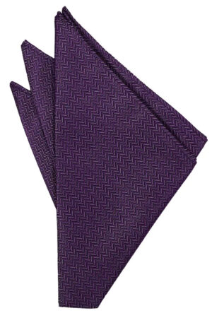 Purple chevron-patterned necktie laid flat with a textured zigzag design