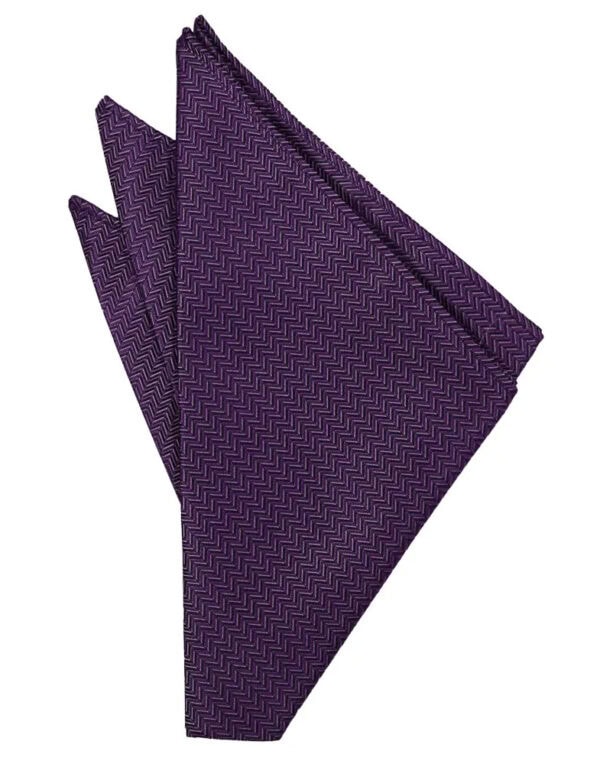 Purple chevron-patterned necktie laid flat with a textured zigzag design