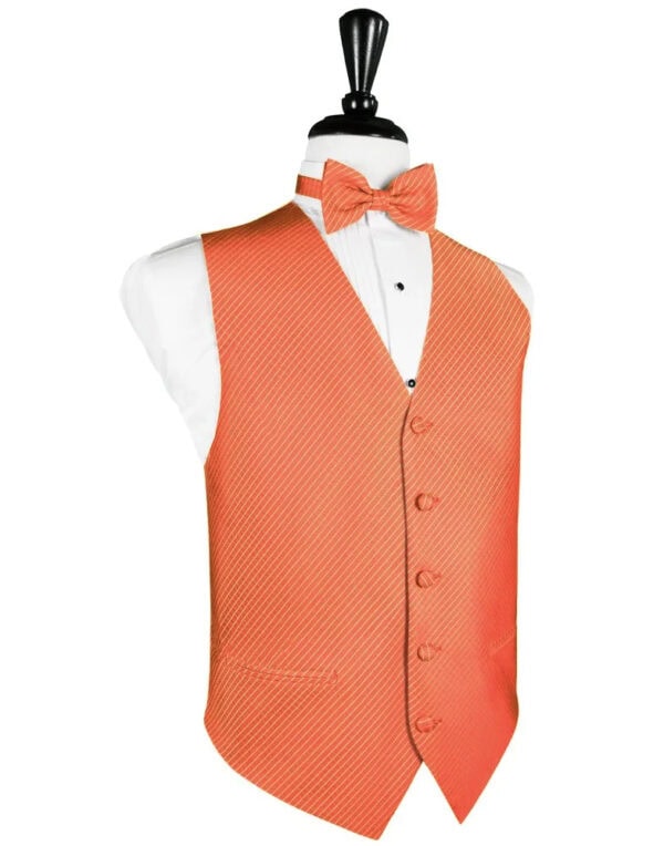 Orange striped formal vest with matching bow tie over a white dress shirt on a mannequin.