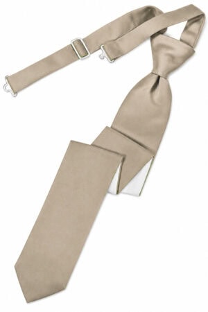 Beige necktie laid out with accompanying adjustable strap and metal buckles on a white background, shown flat.