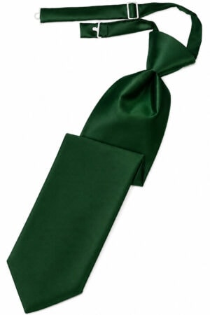 Green satin necktie with a large knot and adjustable strap lying diagonally on a white background