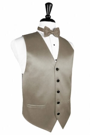 Beige formal vest with black buttons over a white shirt and matching bow tie on a dress form mannequin.