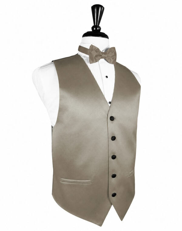 Beige formal vest with black buttons over a white shirt and matching bow tie on a dress form mannequin.