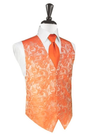 Orange patterned waistcoat over a white shirt with an orange tie on a mannequin (formal menswear)