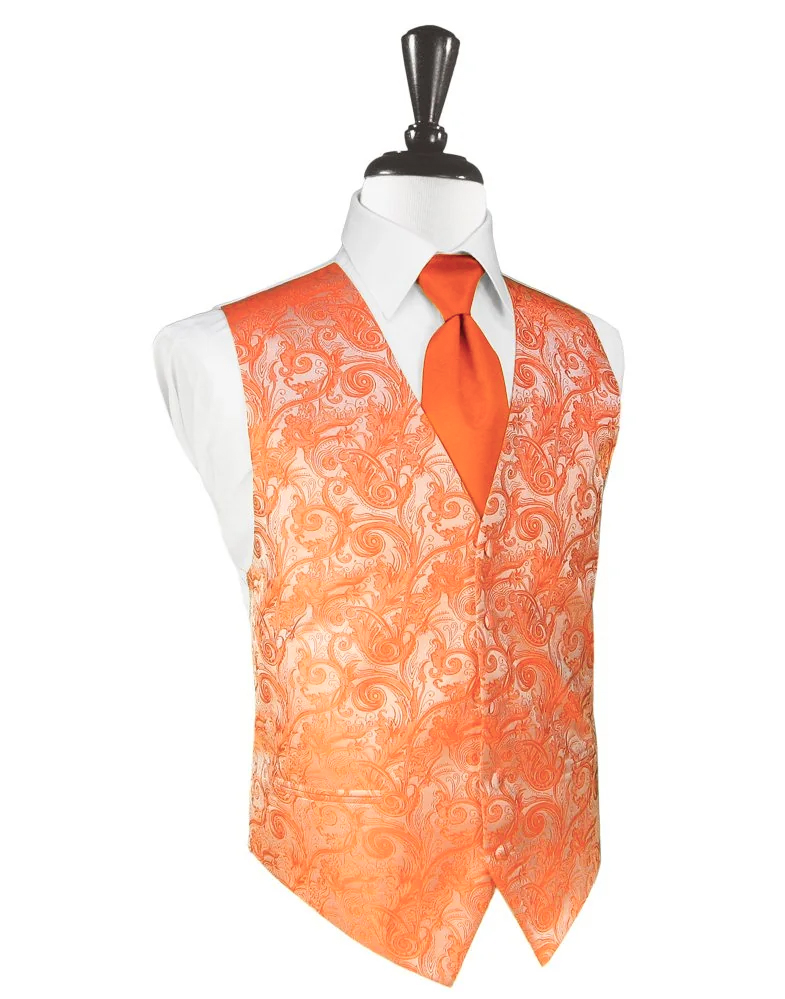 Orange patterned waistcoat over a white shirt with an orange tie on a mannequin (formal menswear)