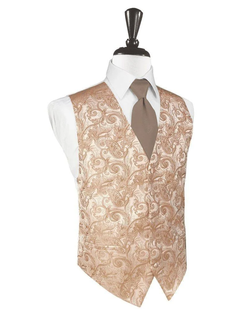 Mannequin wearing a beige paisley vest over a white dress shirt with a brown tie.