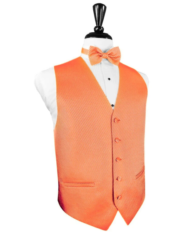 Orange textured vest with matching bow tie over a white dress shirt on a mannequin.