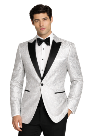 a man wearing a white paisley tuxedo rental