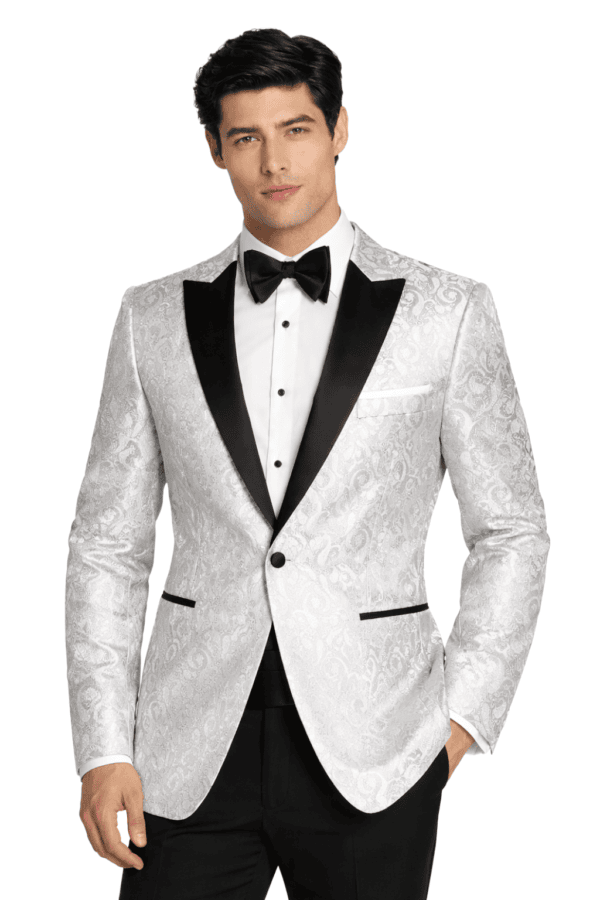 a man wearing a white paisley tuxedo rental