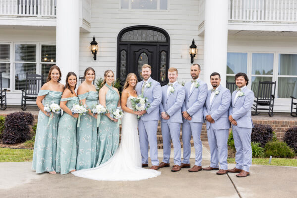 FC5F62D3-C8E3-4775-A005-E10181CDE494 | National Tuxedo Rentals wedding party in light oxford blue suit rentals