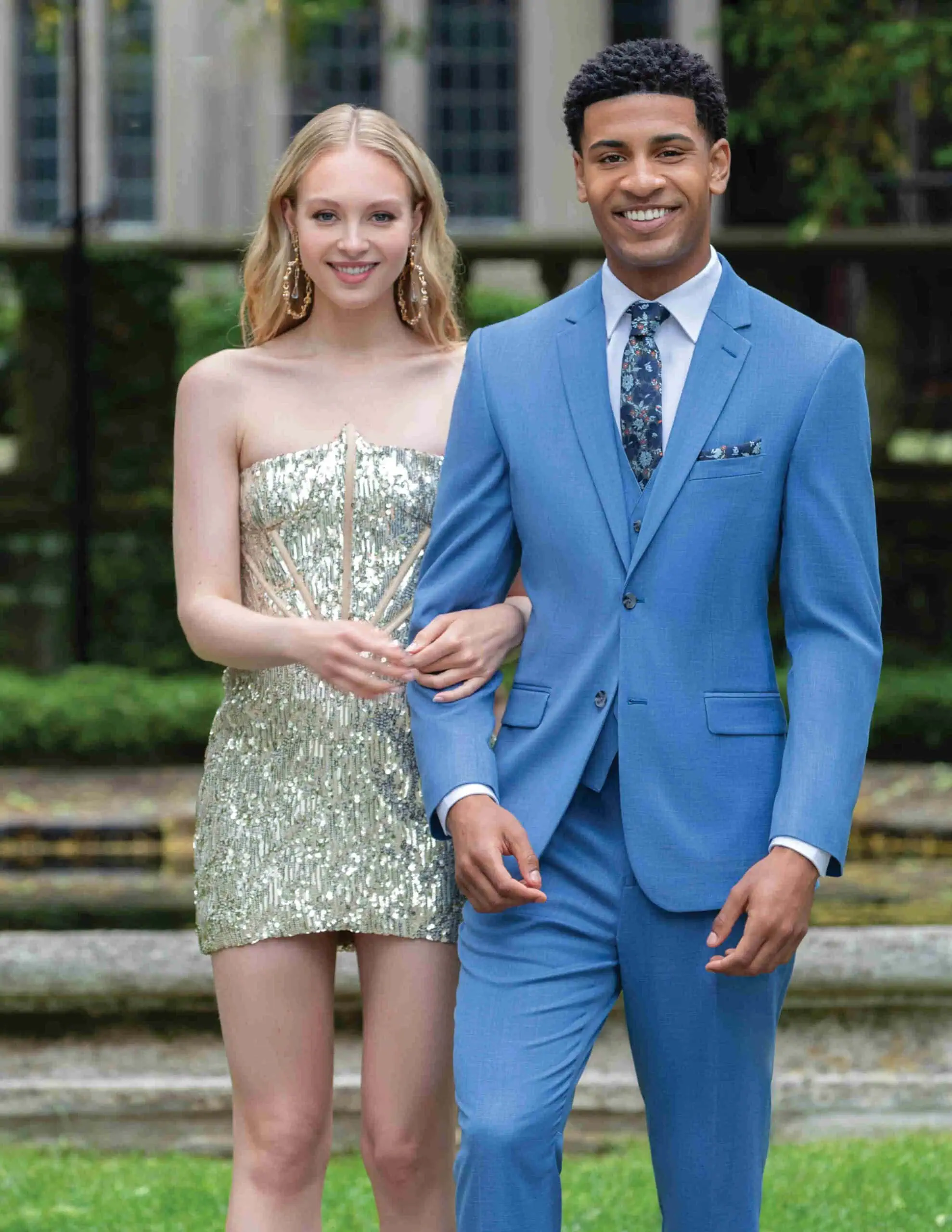 FCGIedit000 a man wearing a blue prom suit rental with his prom date