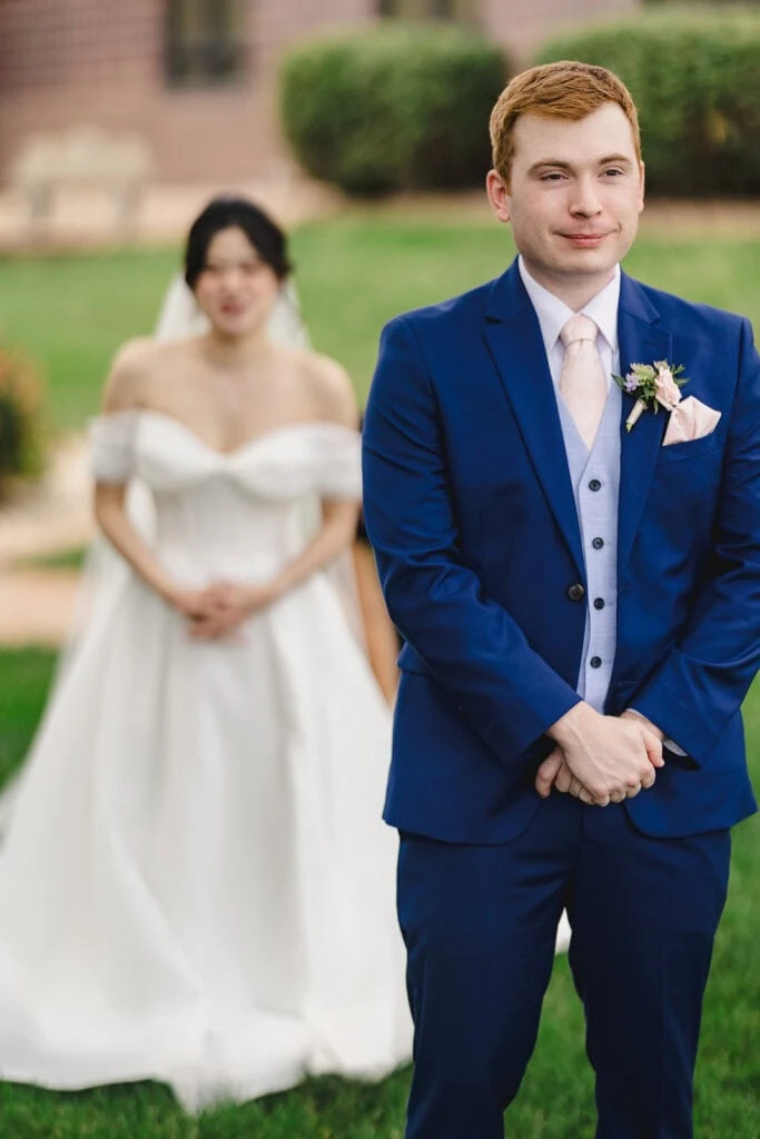 bride and groom doing first look