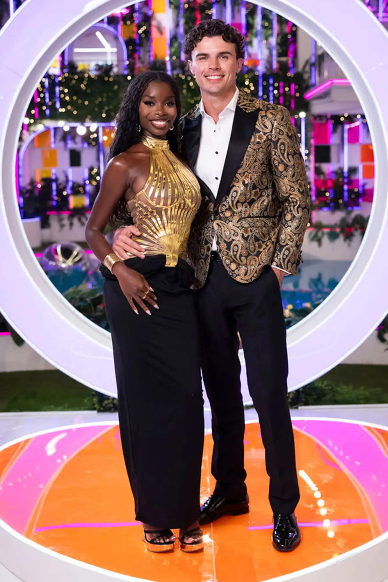 olandria-nic-Love-Island-USA-Season-7-071325-9ee5170d29c74698845365f7ad8cc83c nic from love island wearing a gold tuxedo