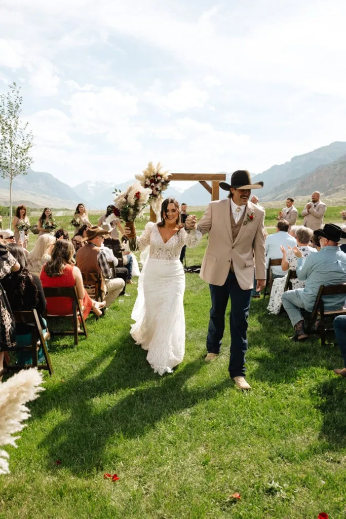 wedding party in tan suit rentals