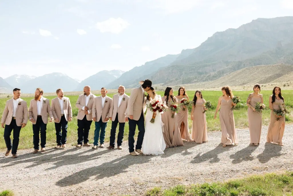 wedding party in tan suit rentals
