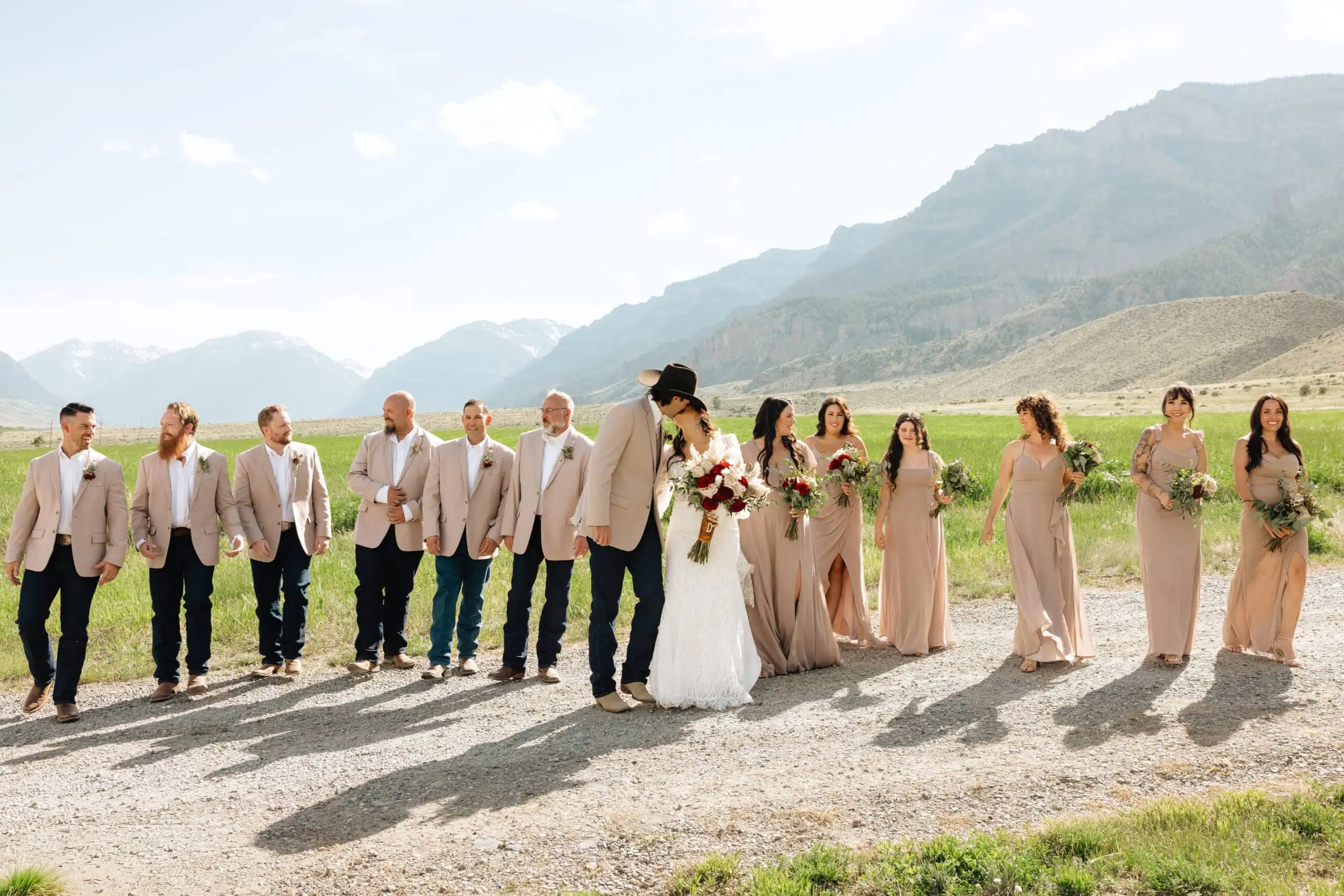 wedding party in tan suit rentals