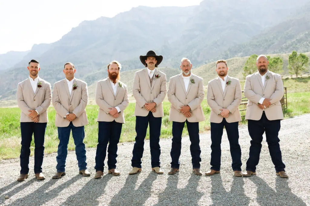 wedding party in tan suit rentals