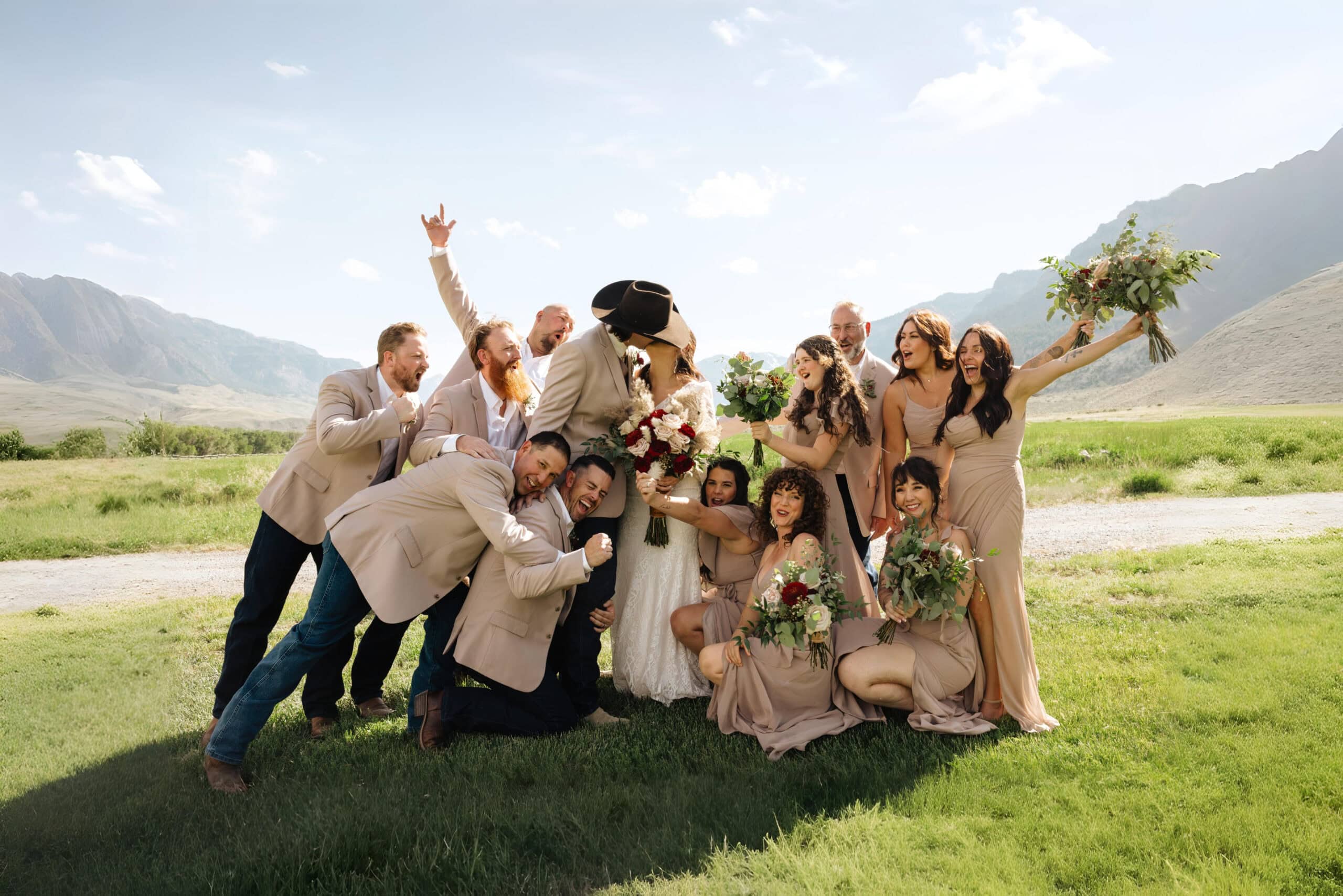 BriBischofPhoto2025-413 1 wedding party in tan suit rentals