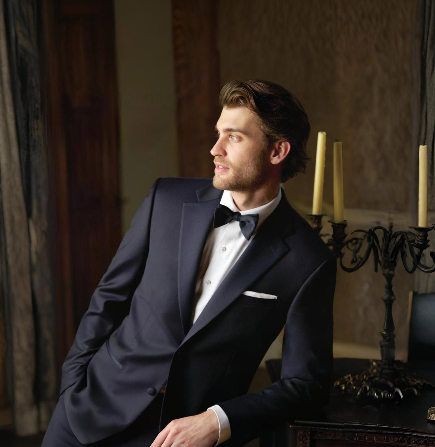 man in a fitted tuxedo rental