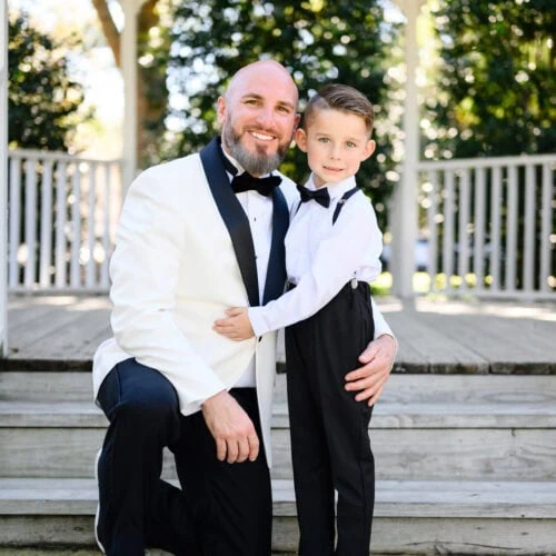 groom and ringbearer at wedding
