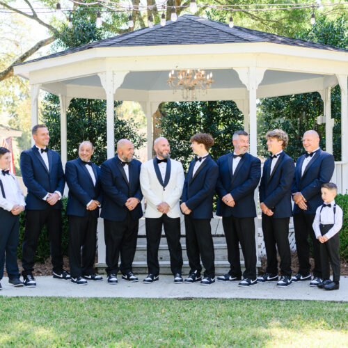 Shannon and Eddie Wedding Day | National Tuxedo Rentals wedding party wearing navy blue tuxedo rentals