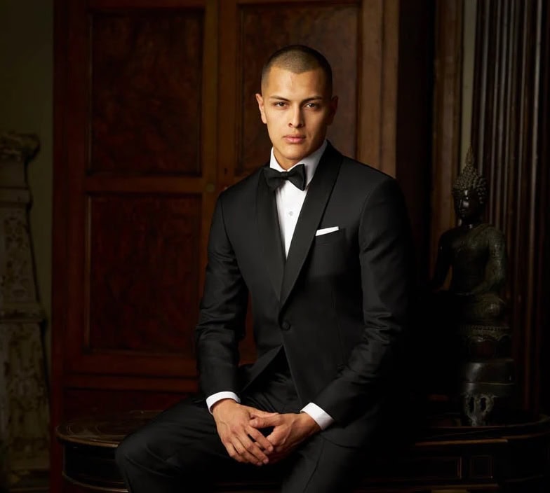 man modeling black shawl tuxedo rental