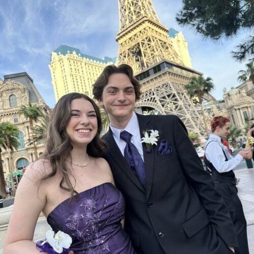 prom couple in front of eiffell tower