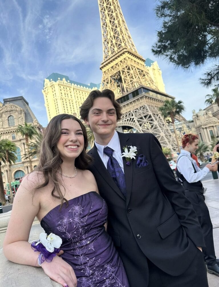 promcouple | National Tuxedo Rentals prom couple in front of eiffell tower