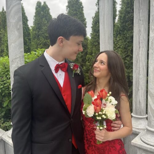 prom couple wearing tuxedo