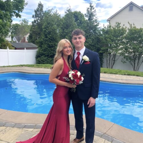 prom couple wearing tuxedo