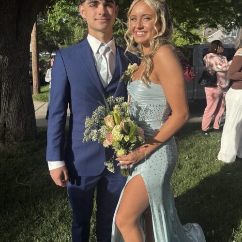 prom couple man wearing blue suit