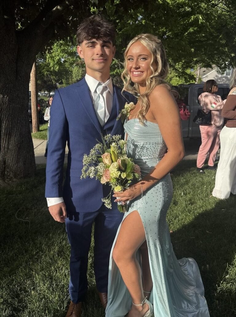 promcouple | National Tuxedo Rentals prom couple man wearing blue suit