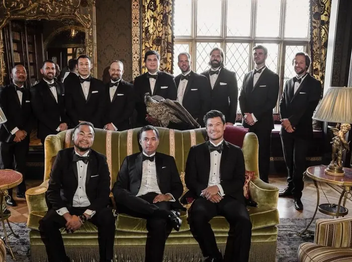 A wedding party of 11 groomsmen
