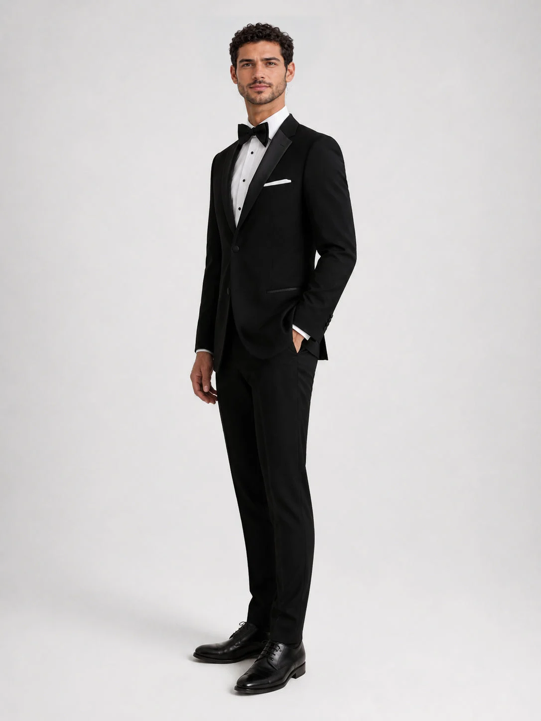 ntr-f06-p08-0e542c68404e | National Tuxedo Rentals Black Barcelona Tuxedo on a model, alternate view 4