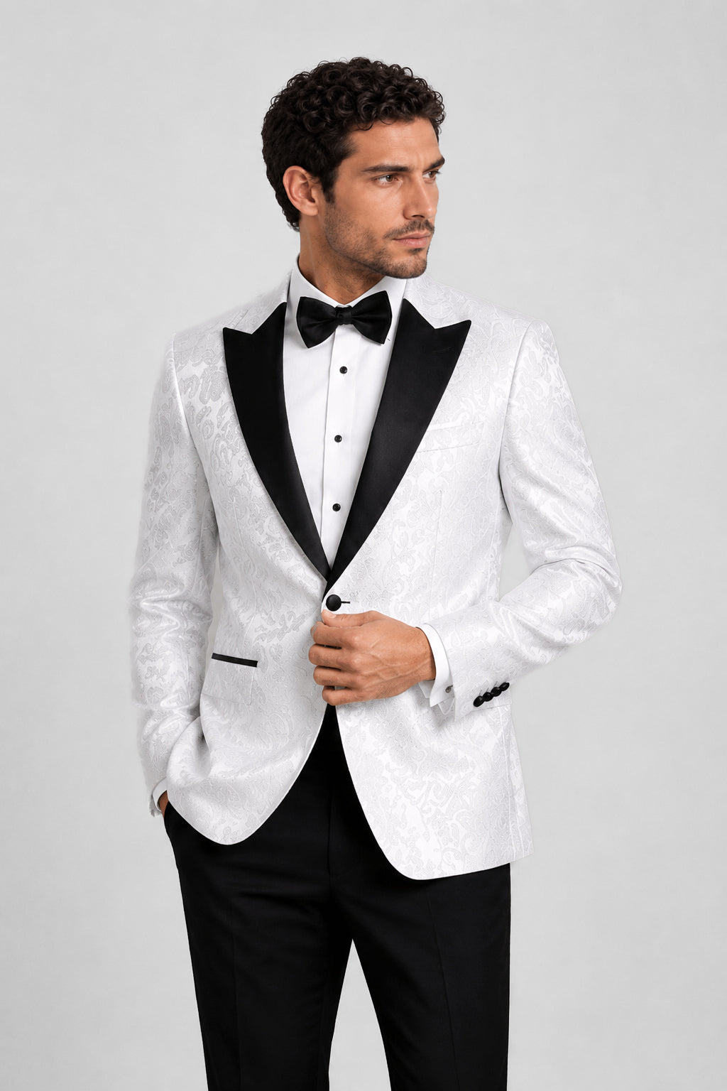 ntr-f33-p02-14340a3ba375 | National Tuxedo Rentals White Paisley Tuxedo on a model, alternate view 1